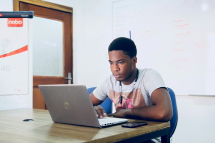 man-in-grey-shirt-using-grey-laptop-computer.jpg man in grey shirt using grey laptop computer